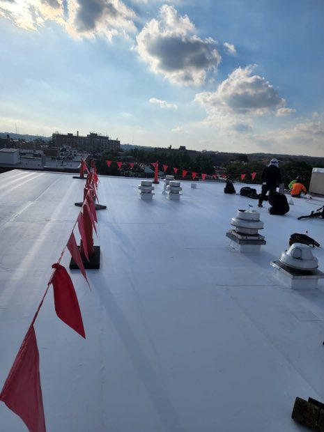 Dark membrane run with crew working the field.
