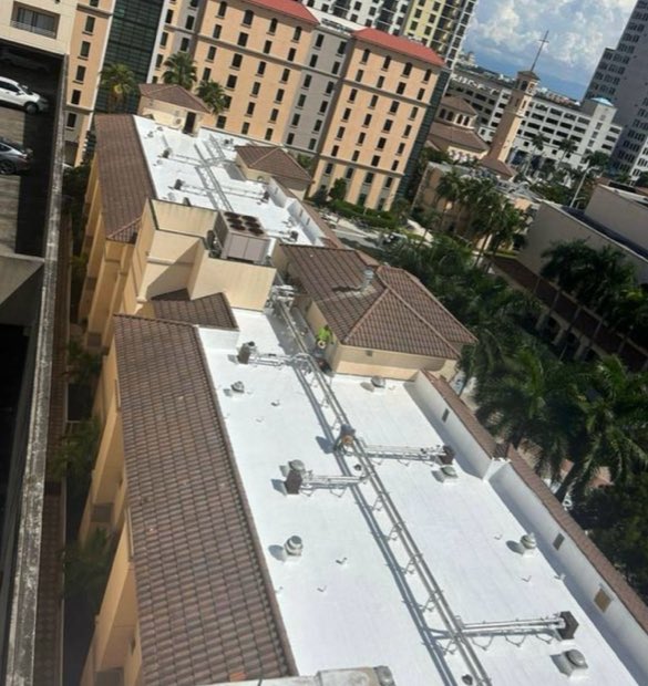 Tile field and low-slope sections stepping across a mixed-height property.