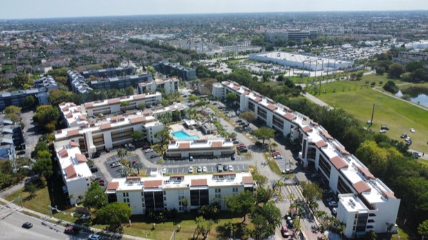 The same community from the south, showing the full roof inventory.