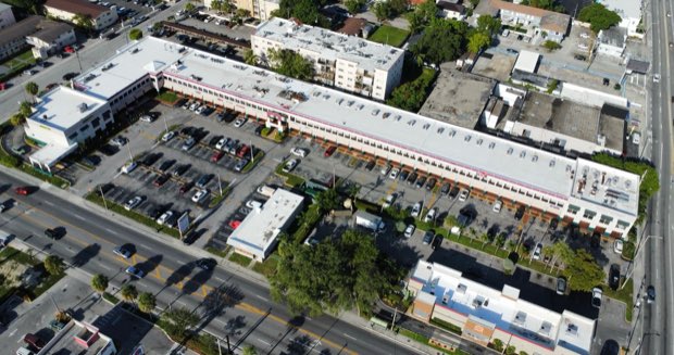 Aerial down a retail corridor, completed roofs the length of the centre.